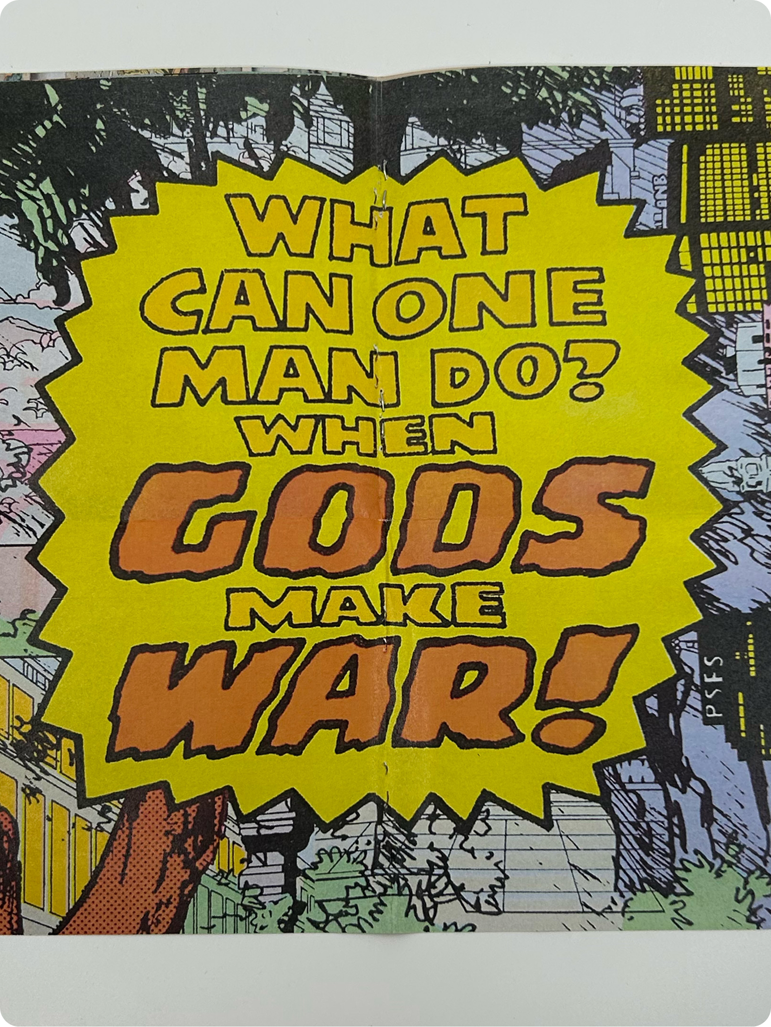 Spread from inside of zine with giant words reading What can man do when Gods Make War